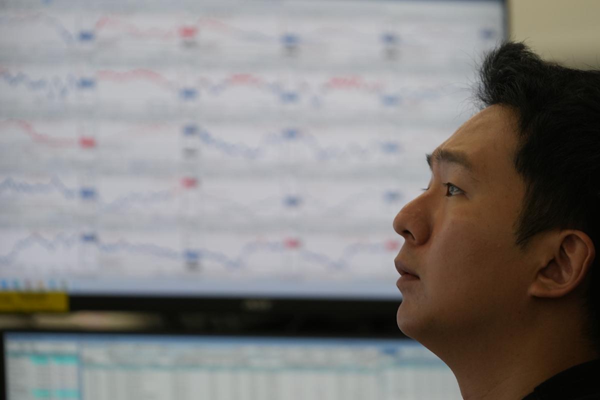 Asian shares follow Wall Street lower as AI worries drag tech stocks lower